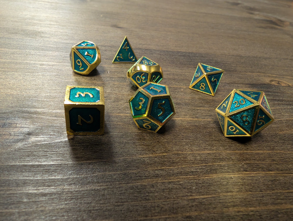 Light blue shadow set of 7 dice w/gold numbers