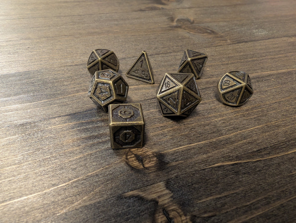 Tarnished block set of 7 dice w/gold numbers